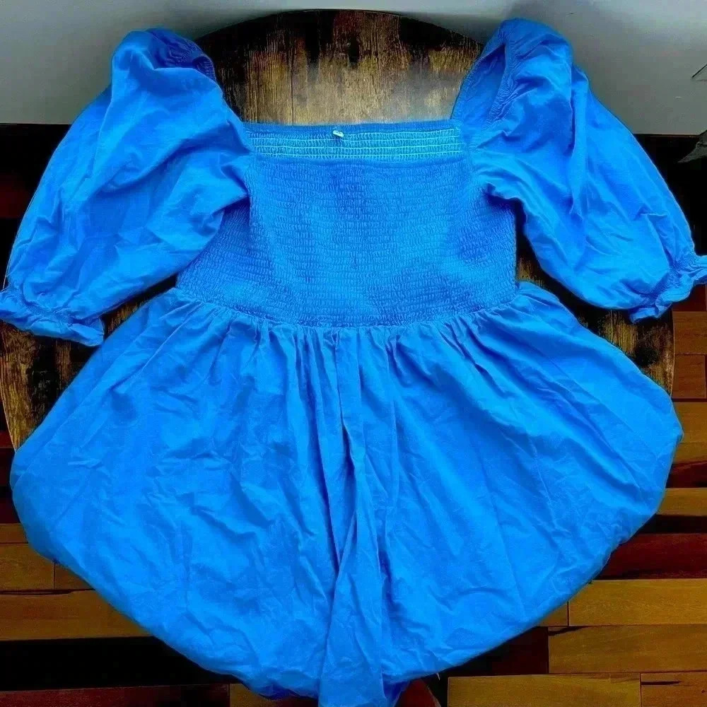 Blue cotton smocked a-line/swing style skirt. Size: XL.